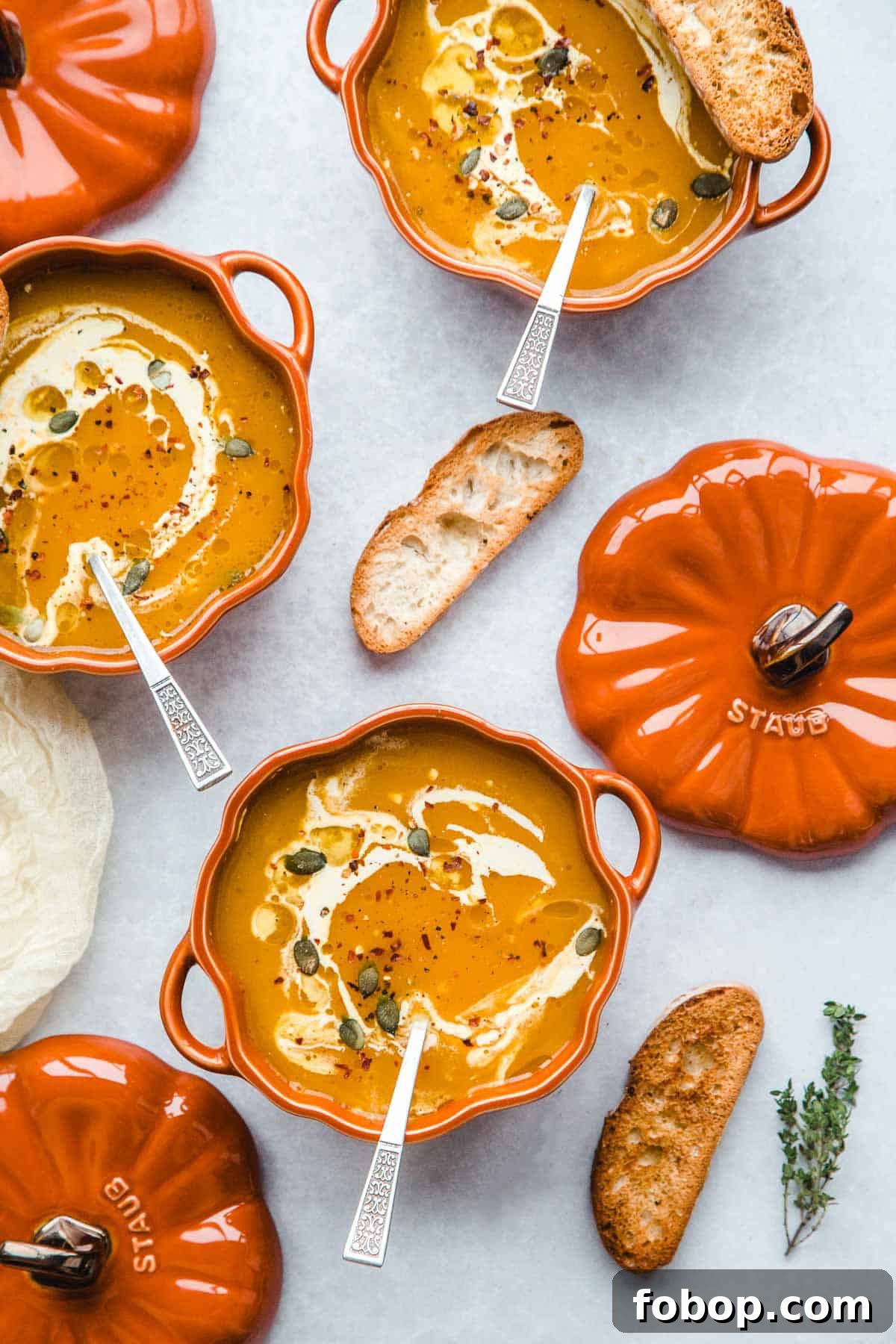 3 Staub pumpkin cocottes with Vegan Pumpkin Soup and toasted bread