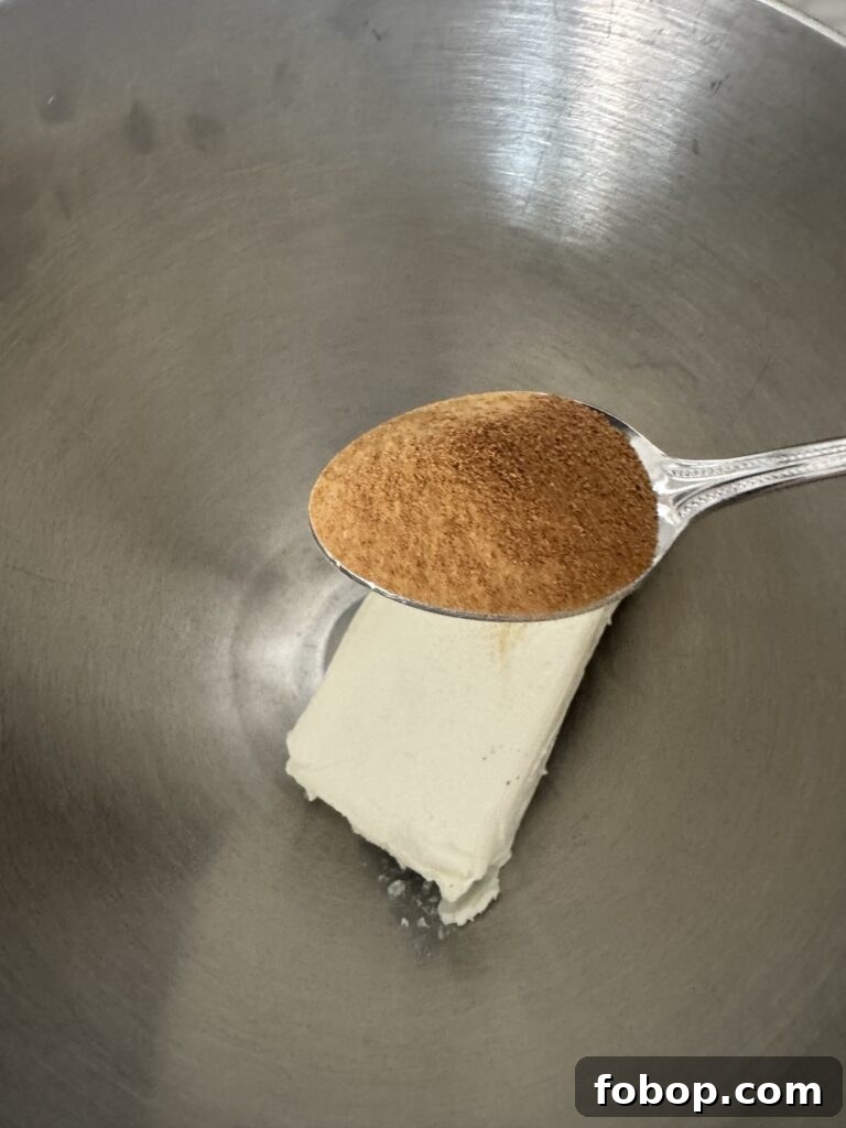 A spoon of Worcestershire powder over cream cheese