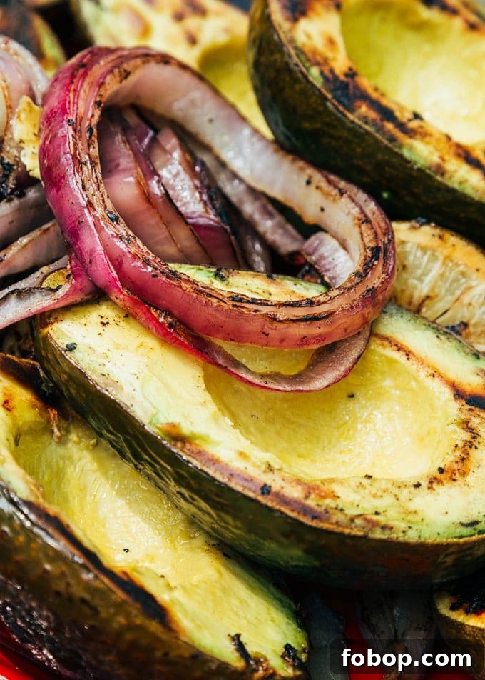 Smoky Grilled Avocado Guacamole Recipe for Backyard BBQs 4 grilled avocados, onions, and limes