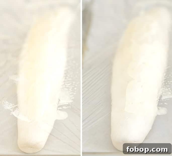 Crispy Gluten-Free French Baguettes: Artisan-Style Recipe 5 Two shaped raw French bread loaves, one unrisen, one risen, both covered with plastic wrap on white paper