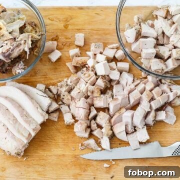 Classic Cobb Salad Recipe with Homemade Dressing and Tips 5 Cutting boneless chicken breasts into diced cubes of meat to use in recipes.
