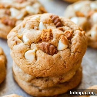 White Chocolate Biscoff Cookie Recipe: Crunchy Layered Cookies 14 Baked white chocolate biscoff cookie stack of 3 on metal baking pan.