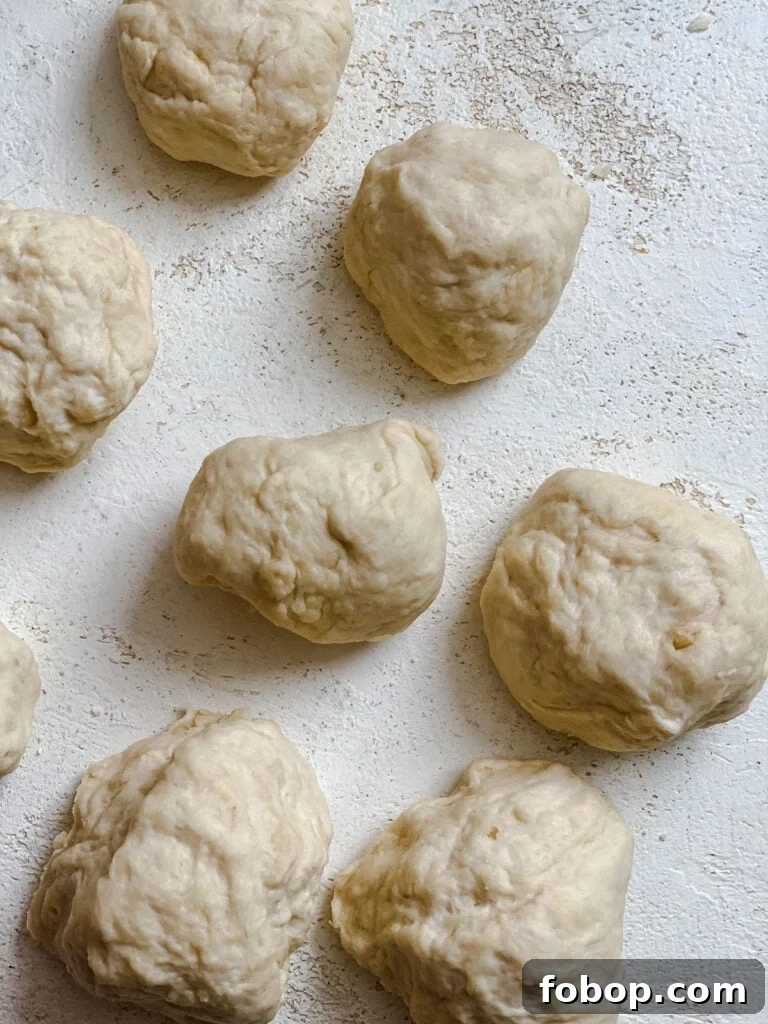 Handmade Flour Tortillas: Authentic Homemade Tortilla Recipe 9 several balls of dough against a white surface