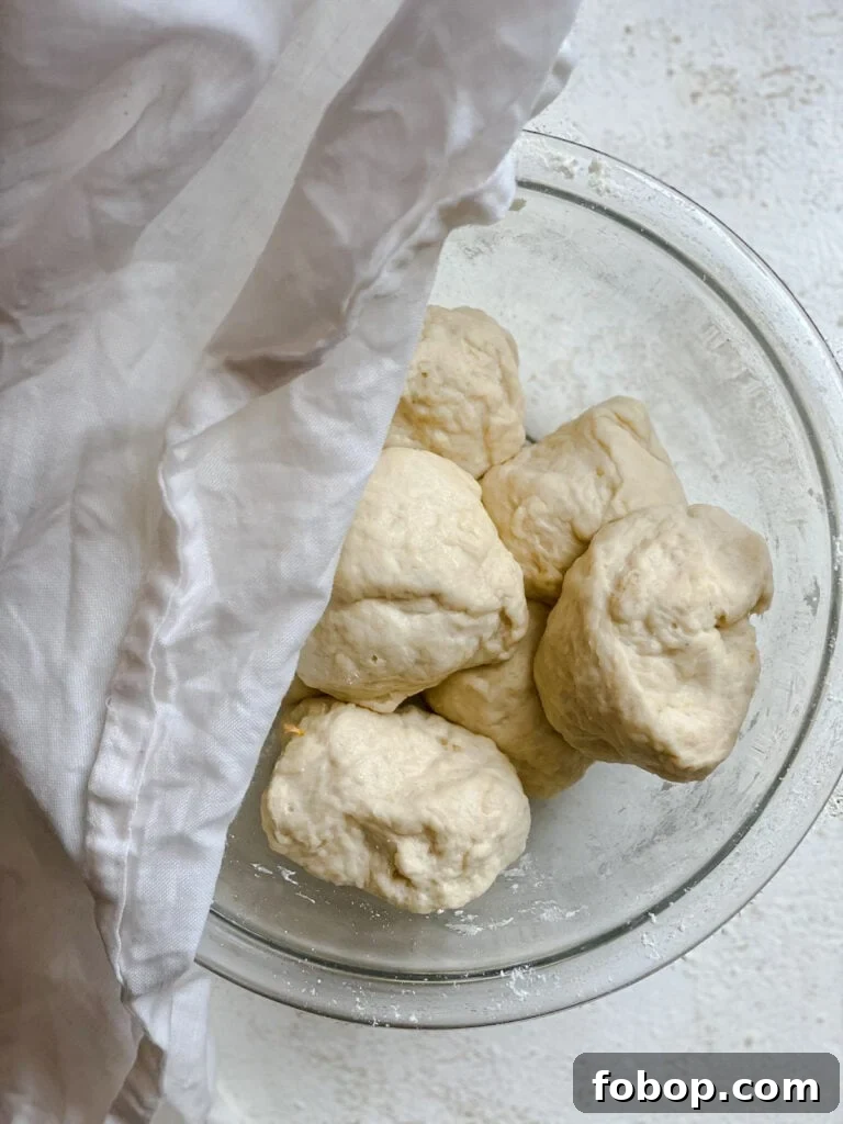 Handmade Flour Tortillas: Authentic Homemade Tortilla Recipe 10 process shot of covering balls of dough in glass bowl