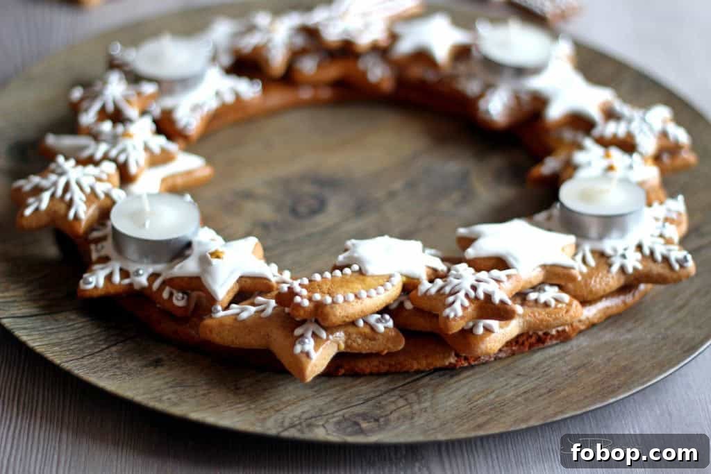 Gingerbread Wreath Recipe: Festive Holiday Cookie Centerpiece 4 Decorated gingerbreads with icing, and placed on wooden plate as advent wreath