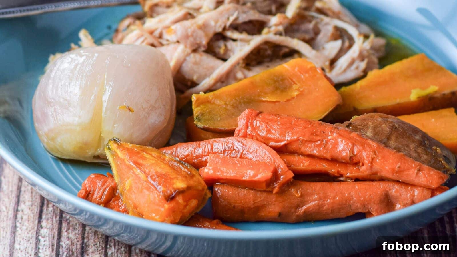 17 Flavor-Packed Side Dishes to Elevate Any Meal 12 Vegetables on a blue plate with pulled pork