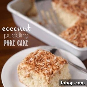 A slice of cake on a plate, with Pudding and Coconut