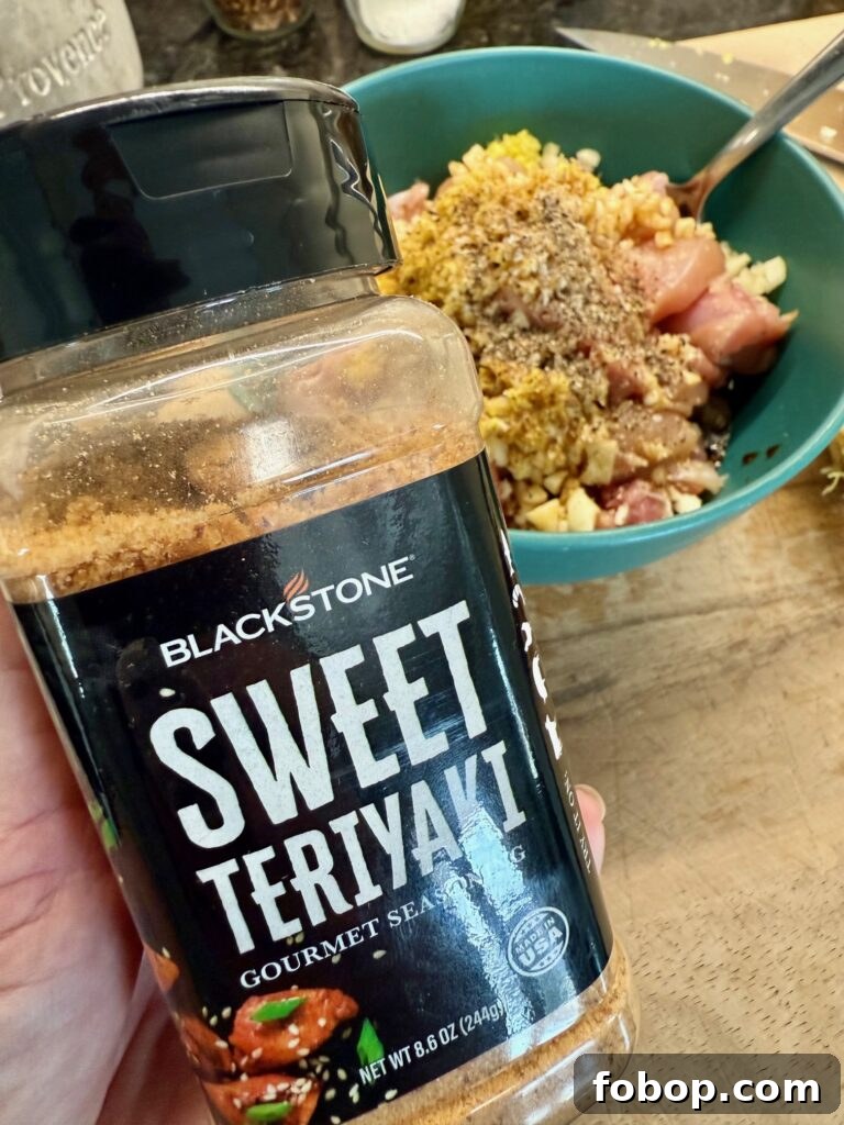 Low-Carb Peanut Chicken Noodles for Blackstone Grill 2 seasoning the chicken