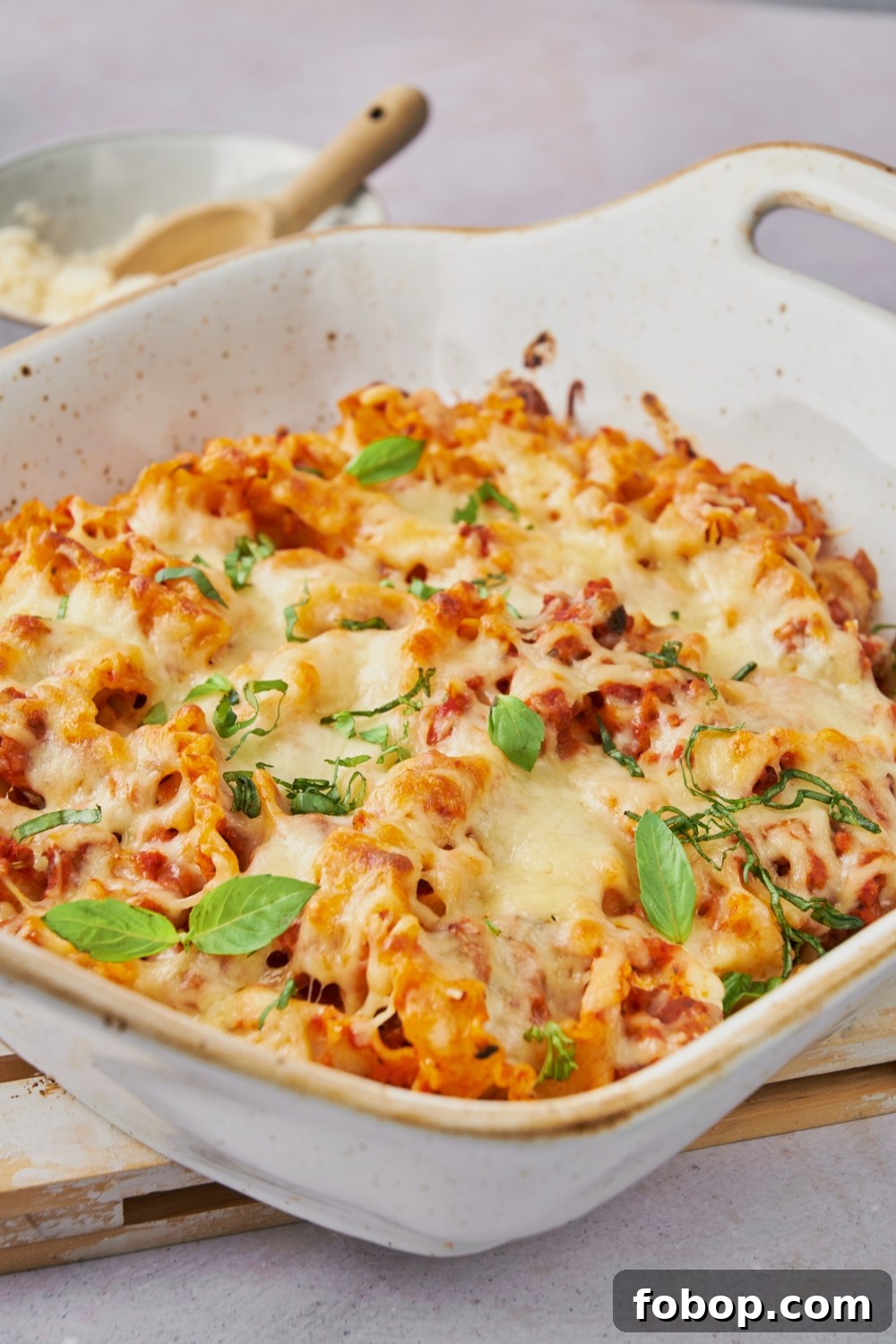 A casserole dish with baked spaghetti.