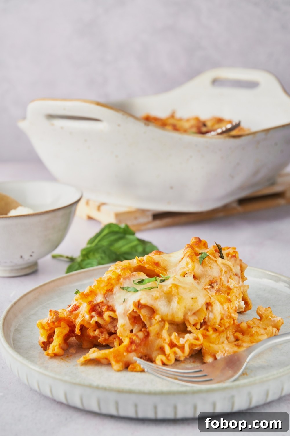 A plate with a portion of baked spaghetti