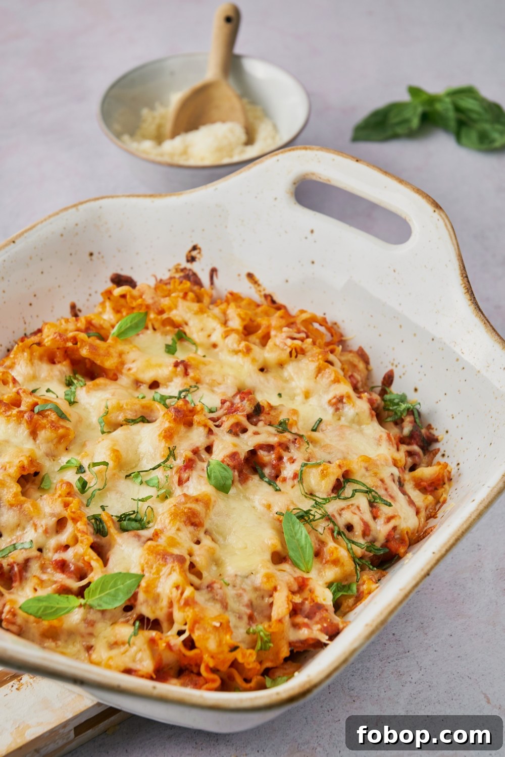 A casserole dish with baked spaghetti.