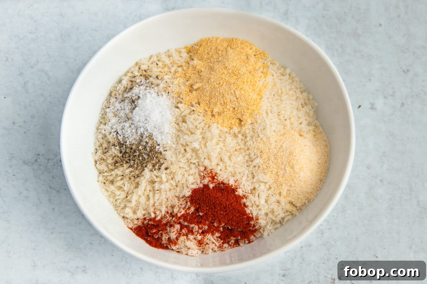This is a picture of the panko in a bowl mixed with spices.