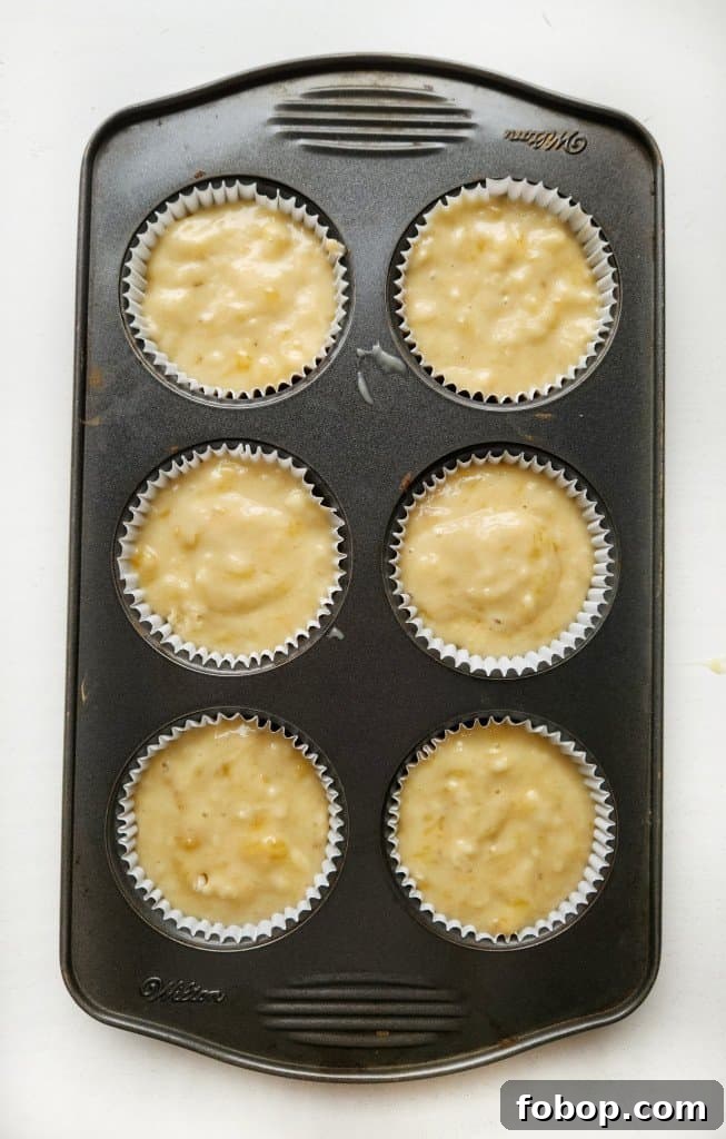 Bakery-Style Banana Muffins Recipe for Moist, Fluffy Bites 7 banana muffins ready for the oven