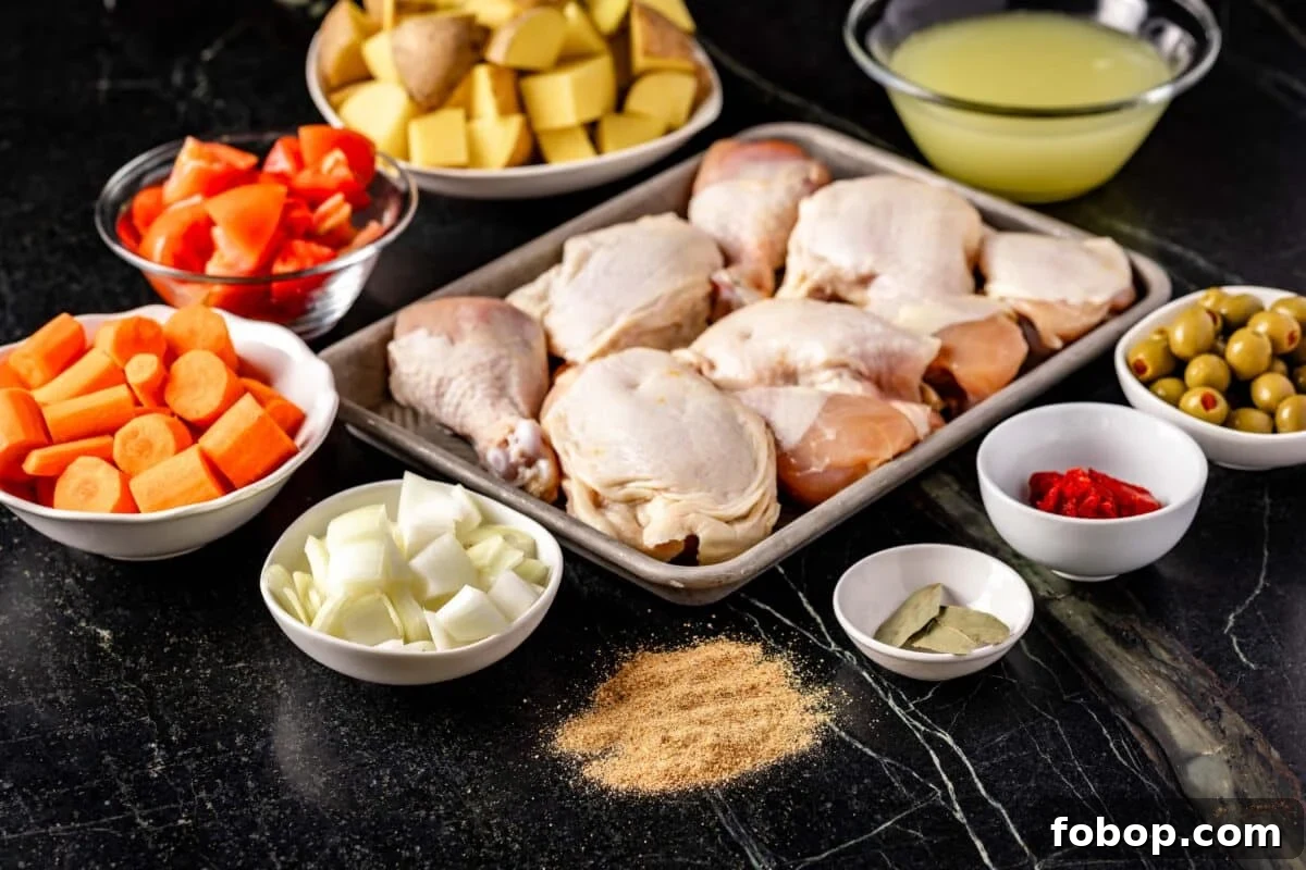 A cast iron pot of raw poultry surrounded by bowls of veggies and seasonings.