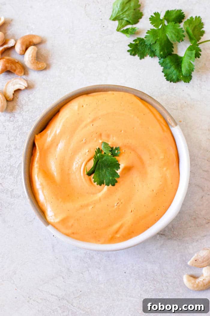 Creamy Vegan Buffalo Sauce Recipe for Wings & Dips 2 buffalo cashew sauce in a dish