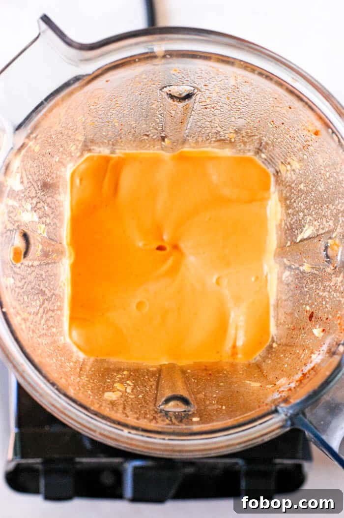 Creamy Vegan Buffalo Sauce Recipe for Wings & Dips 4 buffalo sauce in a blender