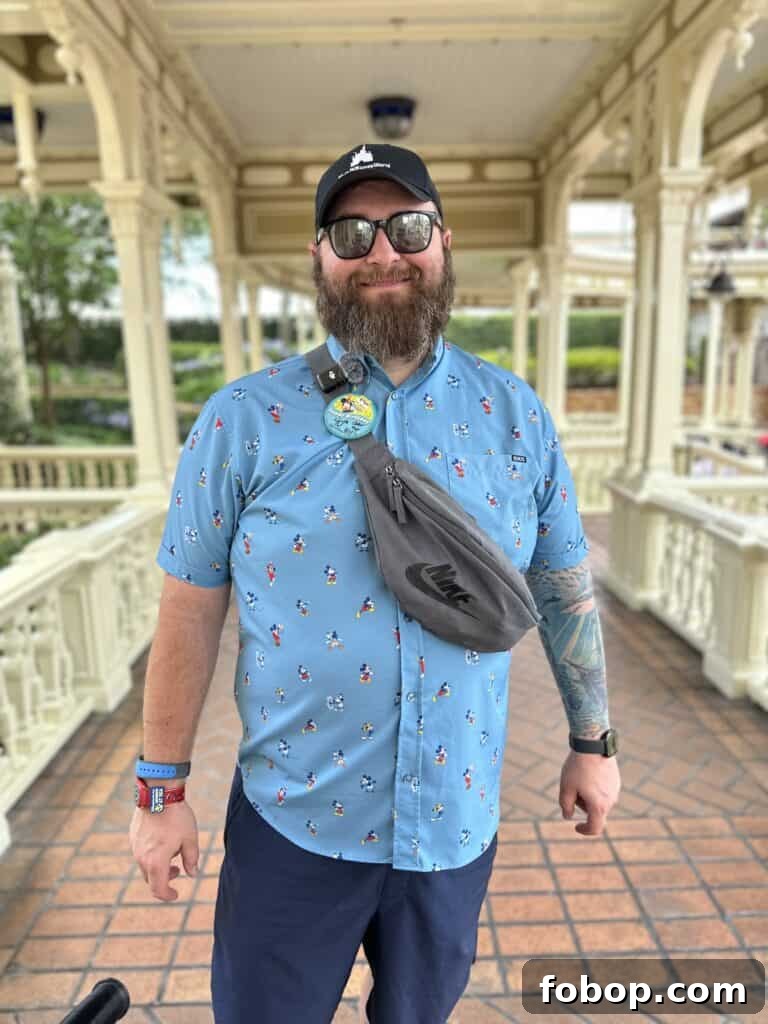Chad with a birthday button on his shirt at Magic Kingdom.