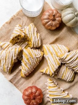 pumpkin scones with a glaze on burlap