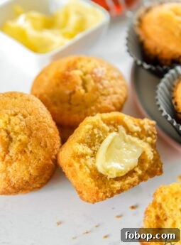 cornbread cut in half with butter spread in the center