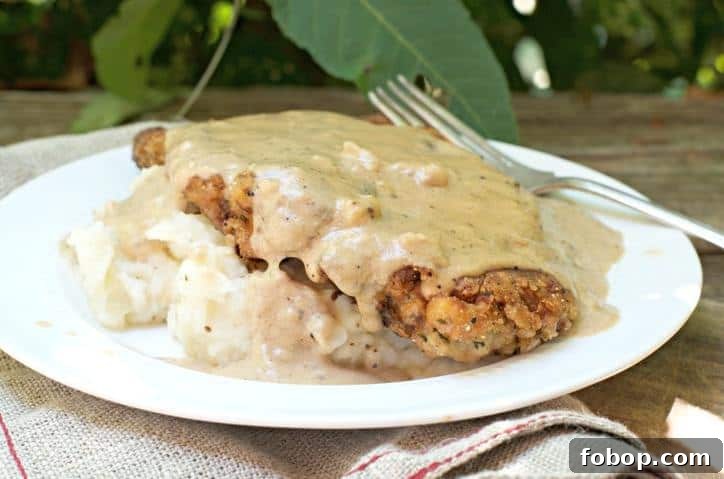 How to Make Breading That Sticks Every Time 2 a photo of The Secret to Perfect Chicken Fried Steak with sunlight shining on the gravy
