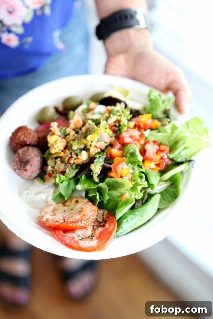 Host a Successful Potluck: Planning, Menu Ideas, and Tips 3 Dinner plate with food