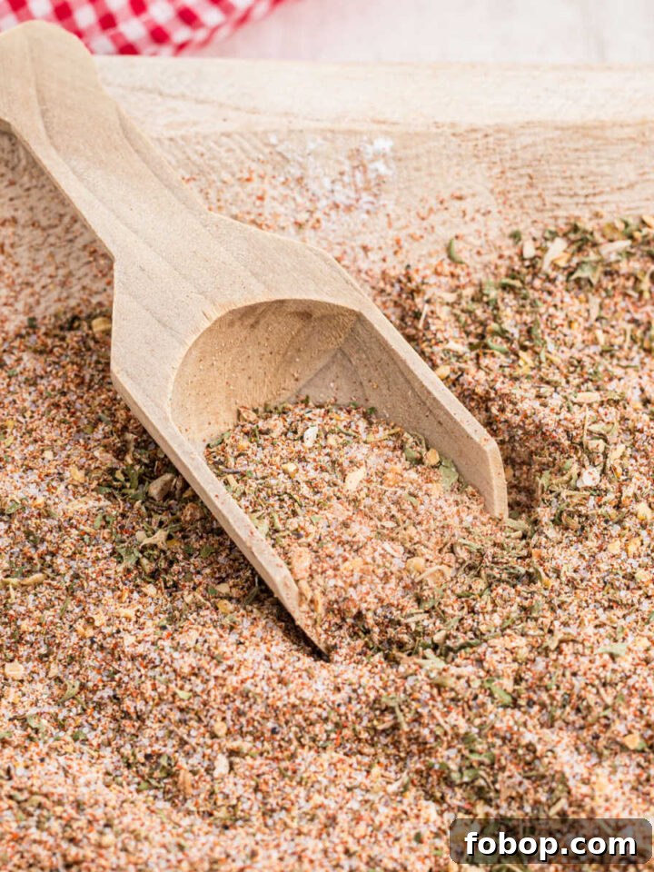 Authentic Homemade Creole Seasoning Recipe for Bold Flavor 11 Close up of a wooden bowl full of all purpose seasoning.