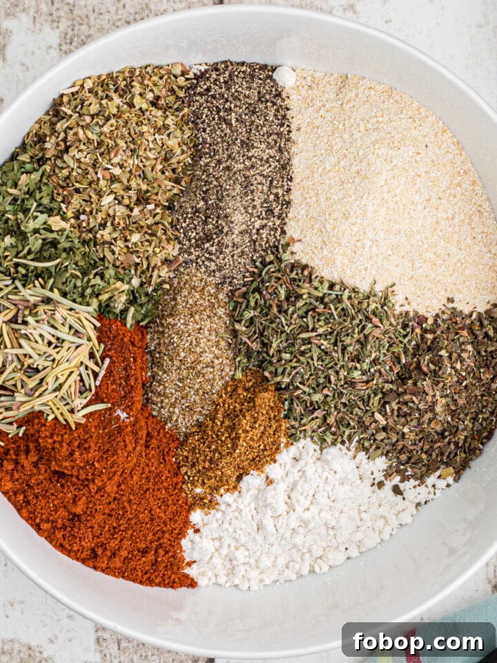 Authentic Homemade Creole Seasoning Recipe for Bold Flavor 12 Overhead shot of a bowl full of seasonings needed to make a roast dinner.