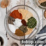 Authentic Homemade Creole Seasoning Recipe for Bold Flavor 14 a bowl full of different spices making a creole seasoning blend
