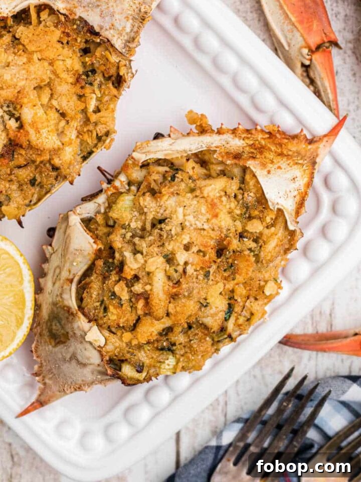 Authentic Homemade Creole Seasoning Recipe for Bold Flavor 8 Close up of a stuffed crab with some boiled crabs on the outside.