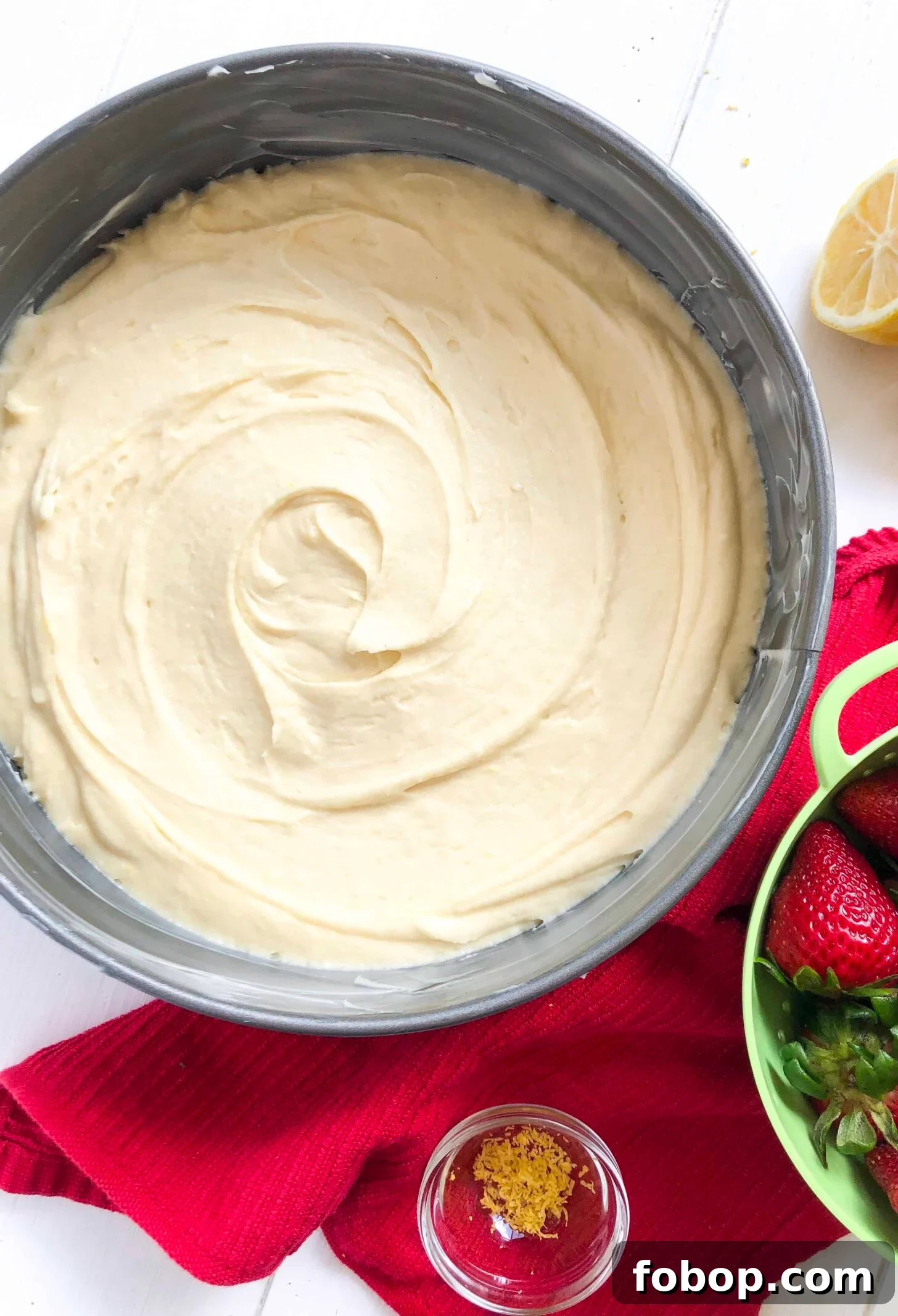 Gluten-Free Lemon Vanilla Cake Recipe for Moist, Zesty Slices 3 Cake batter in a spring form pan ready to be baked