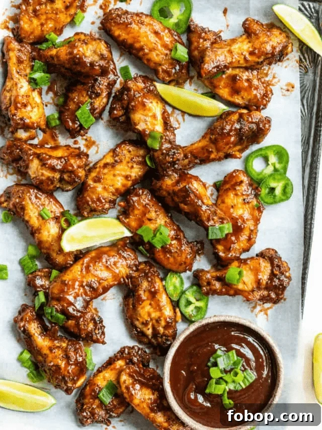 Crispy Cajun BBQ Oven Wings: Super Crunchy Baked Recipe 2 crispy oven baked cajun bbq wings on a serving tray