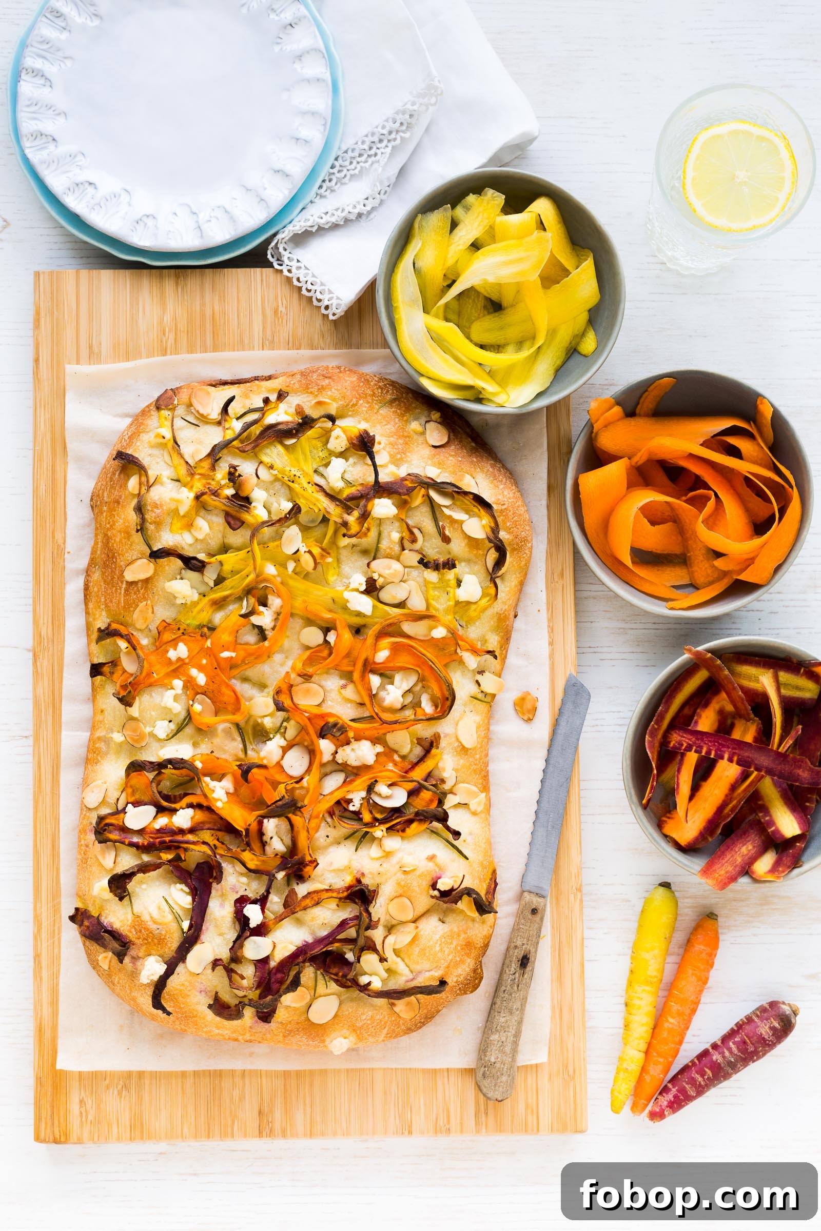 carrot focaccia with feta and almonds