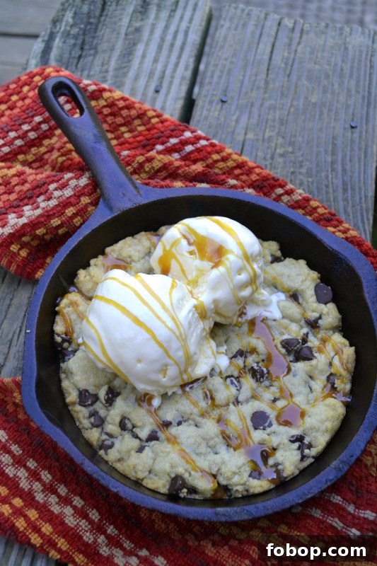 Chocolate Chip Skillet Cookie in cast iron skillet perfect for two from www.ApronFreeCooking.com