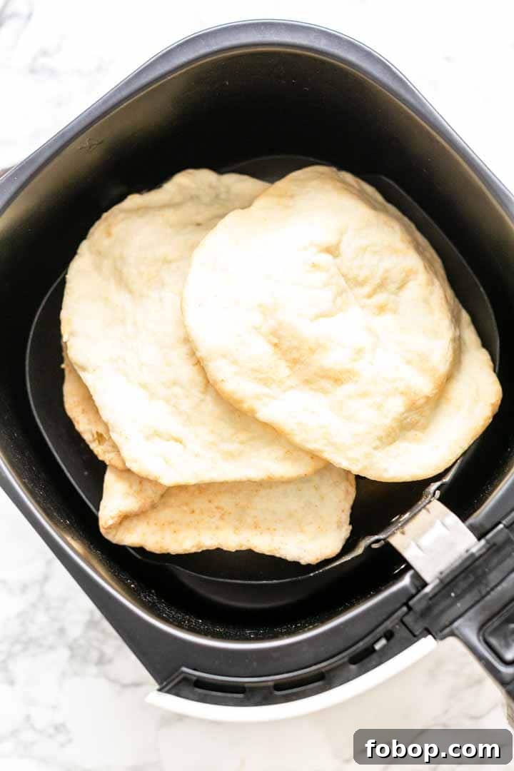 Crispy Air Fryer Flatbread Recipe in Minutes 4 Flour tortilla flatbreads in an Air Fryer or stacked.