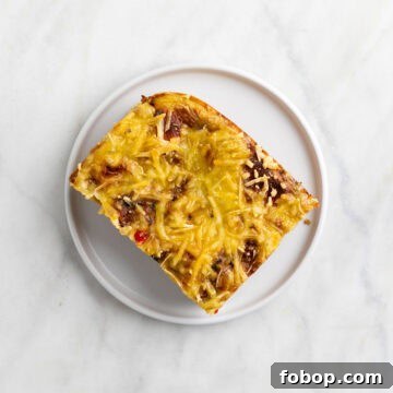 Slice of vegan breakfast casserole on a plate.