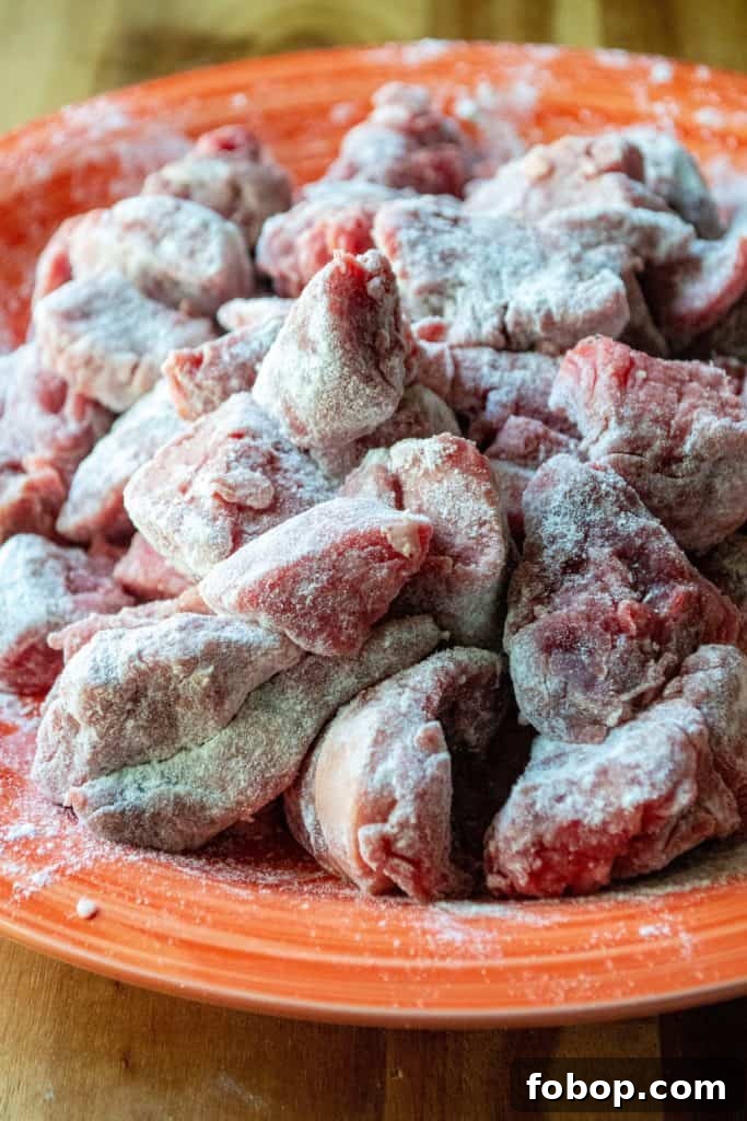 Easy Slow Cooker Beef Stew flour dredged meat
