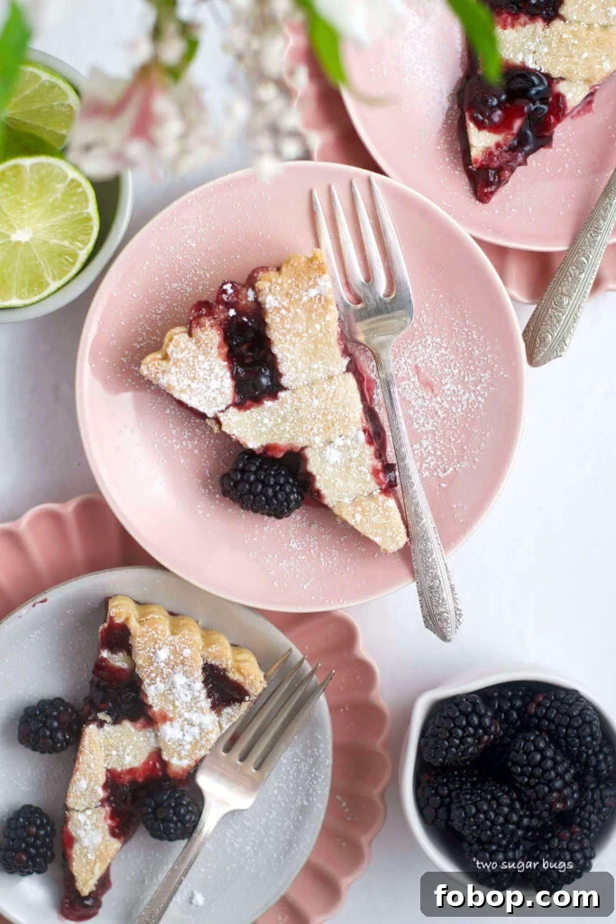Blackberry Crostata Recipe: Rustic Tart with Fresh Berries 13 three slices of blackberry crostata on plates with forks