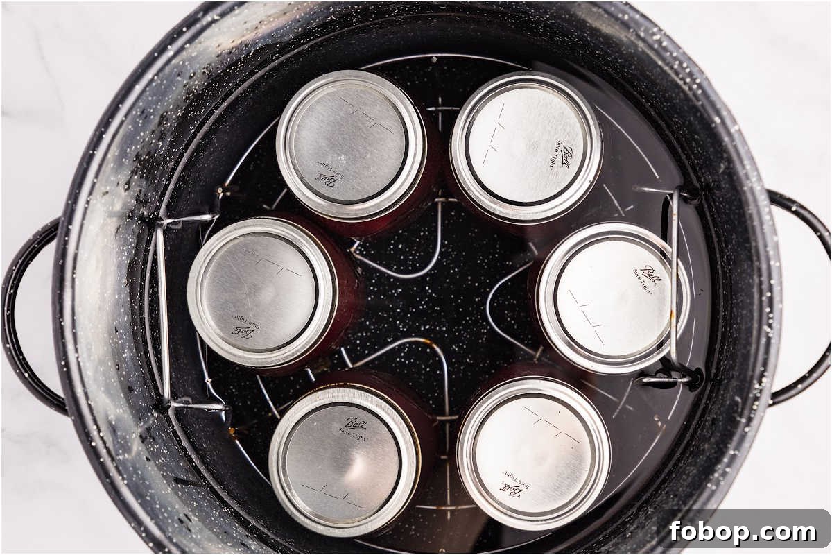 Homemade Cherry Pie Filling for Water Bath Canning: Step-by-Step Guide 10 jars processing in canner.