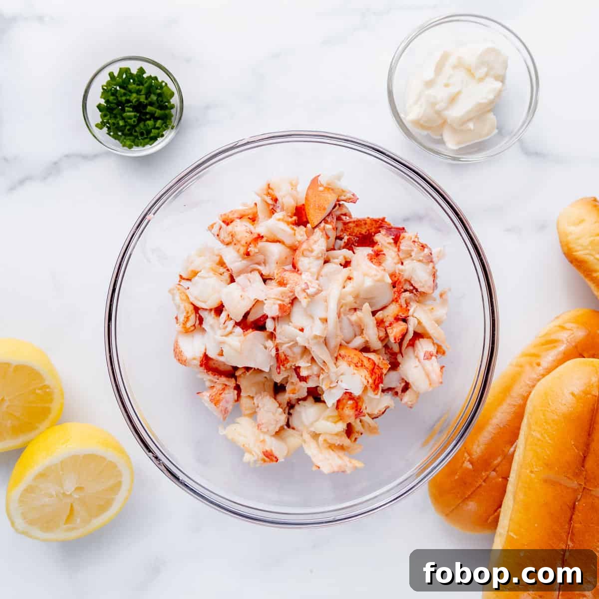 Classic Maine Lobster Roll Recipe: How to Make Authentic Lobster Rolls 4 Overhead image of lobster roll ingredients.