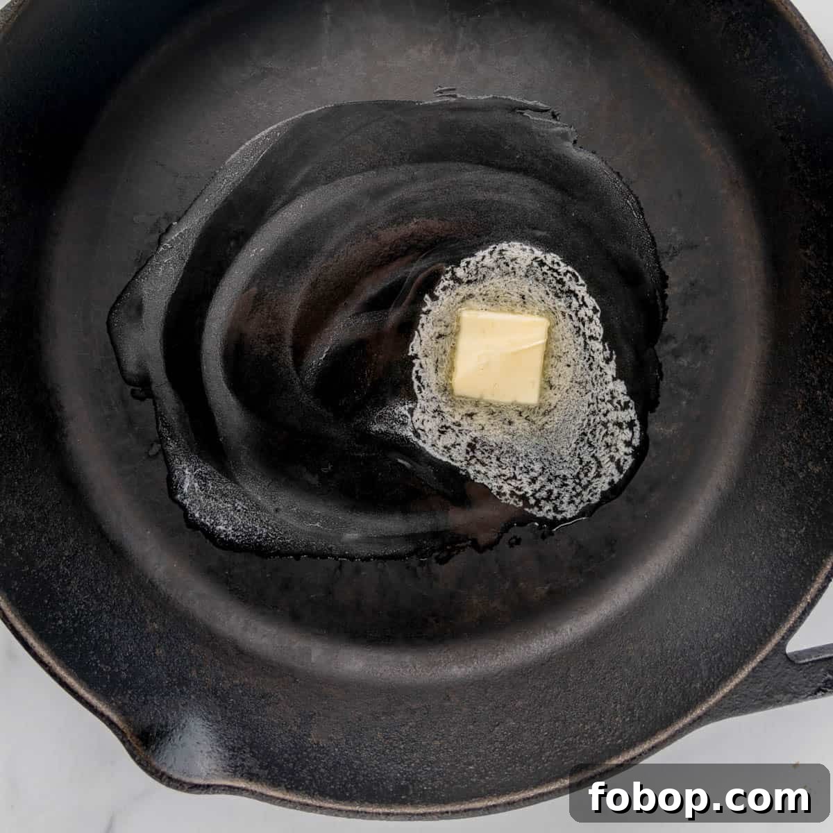 Classic Maine Lobster Roll Recipe: How to Make Authentic Lobster Rolls 7 melted butter in a cast iron skillet.