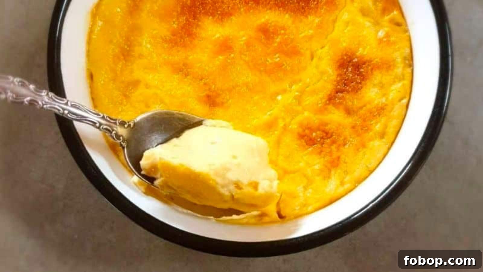 13 Delicious Low-Carb Snacks That Beat Potato Chips 13 A bowl of baked custard with a spoon.