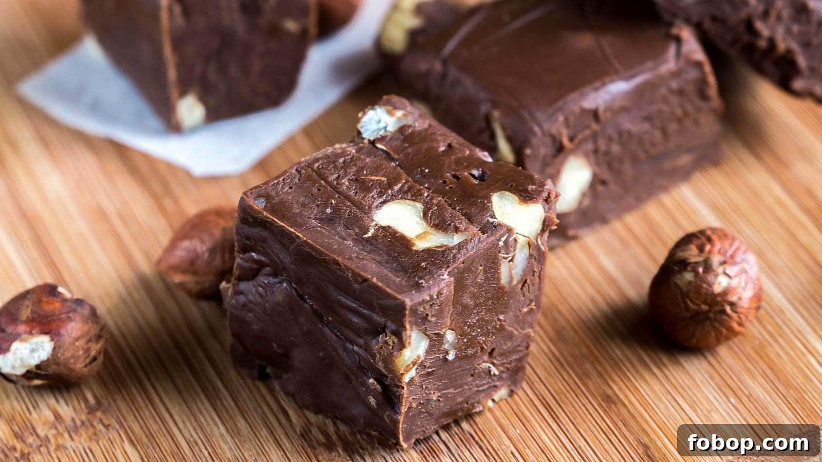 13 Delicious Low-Carb Snacks That Beat Potato Chips 5 A picture of Nutella fudge bites on wooden cutting board.