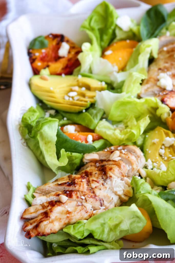 Grilled Peach and Avocado Chicken Salad with Honey-Lime Dressing 5 close up of grilled peach avocado chicken salad