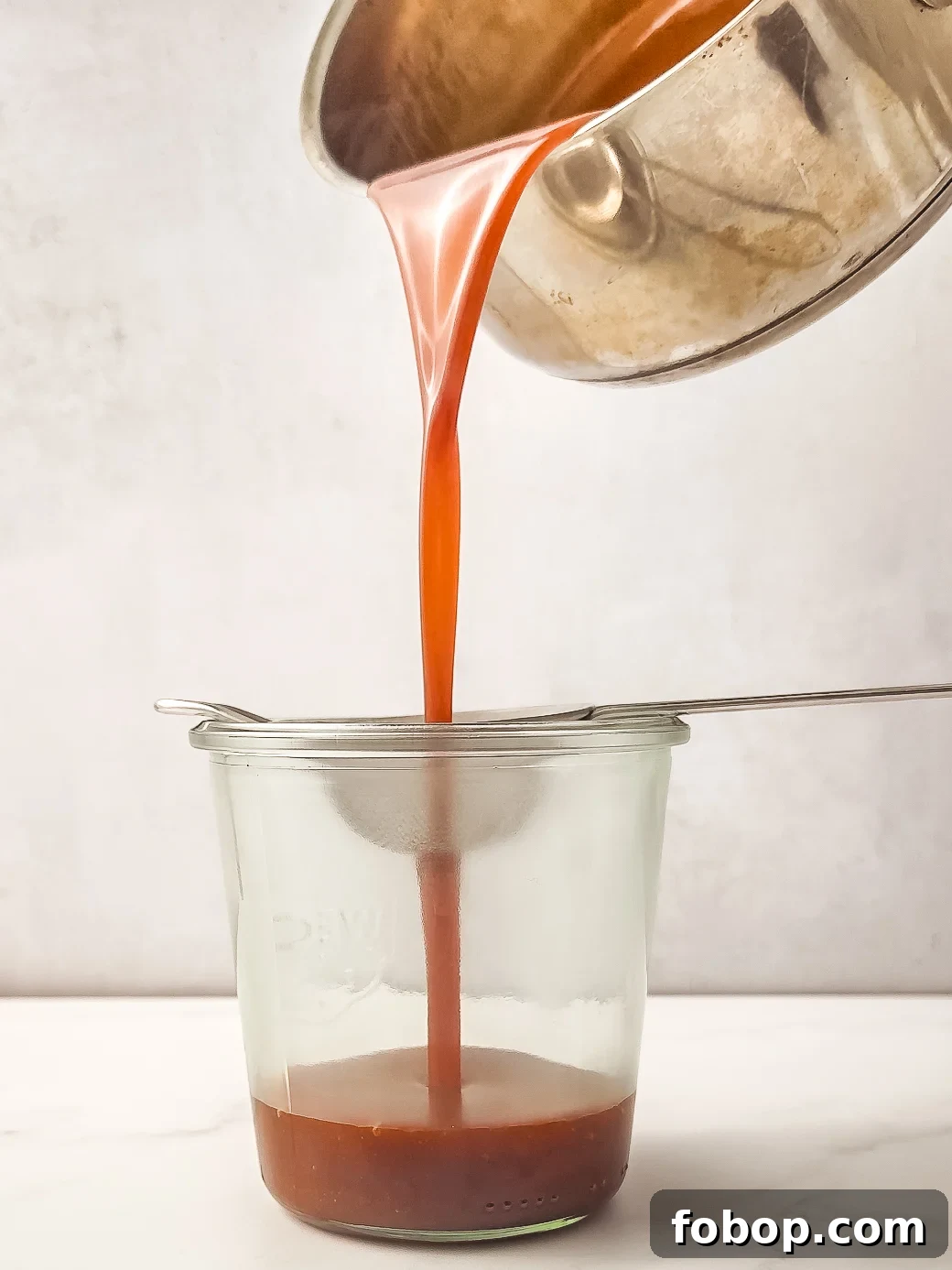 Homemade Caramel Recipe: Smooth, Rich Caramel Sauce in Minutes 7 Caramel poured into jar