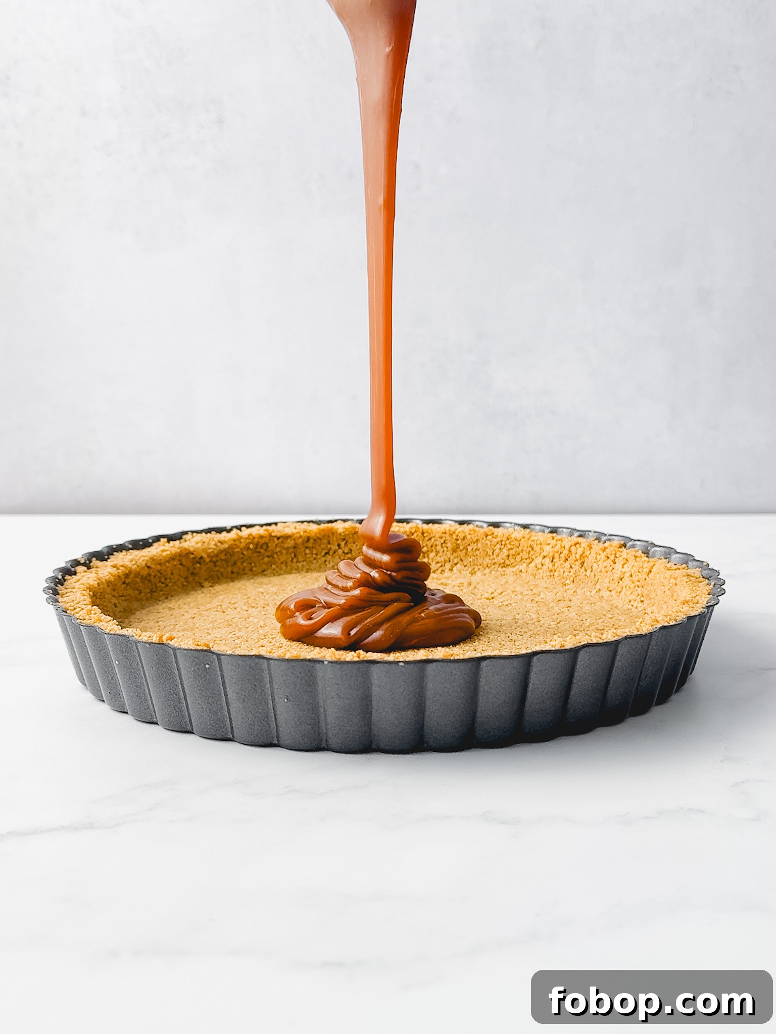 Homemade Caramel Recipe: Smooth, Rich Caramel Sauce in Minutes 8 Salted caramel on spoon