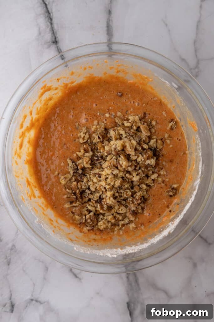 Moist Carrot Loaf Cake Recipe with Oil (Loaf Pan Method) 8 Chopped walnuts folded into batter