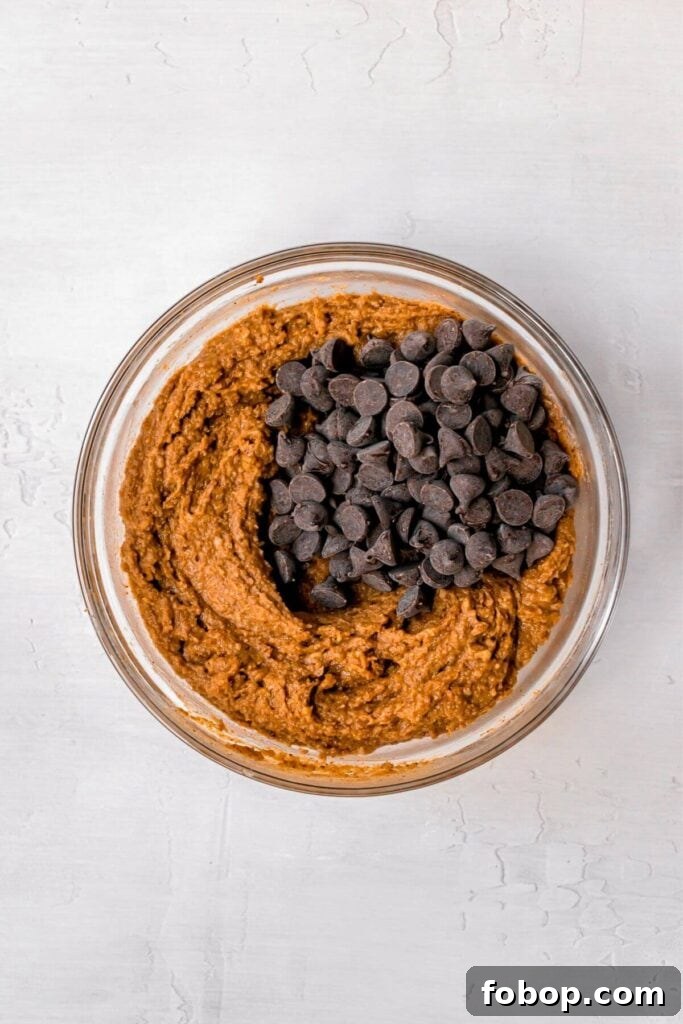 pumpkin spice chickpea blondie batter with chocolate chips