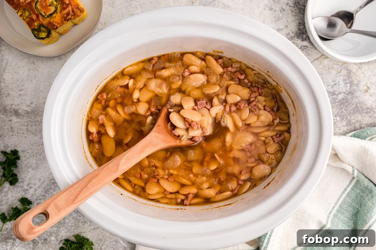 Creamy Slow Cooker Lima Beans Recipe for Weeknight Dinners 5 overhead shot of slow cooker lima beans.