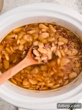 Creamy Slow Cooker Lima Beans Recipe for Weeknight Dinners 8 overhead shot of slow cooker lima beans.