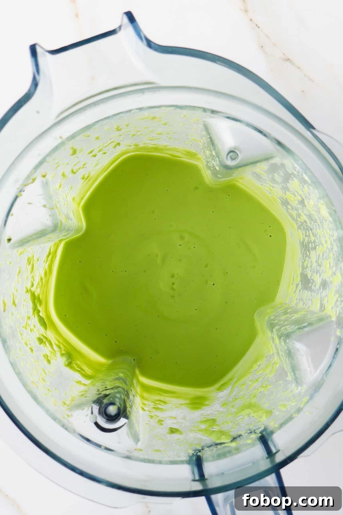 Avocado dressing in a blender.